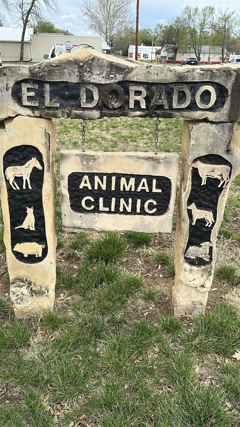Dirty stone sign before cleaning, El Dorado, KS
