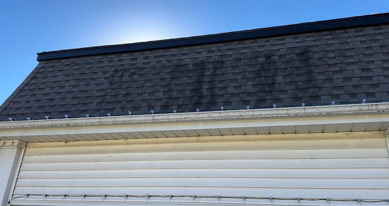 Streaked garage roof before roof cleaning, El Dorado, KS
