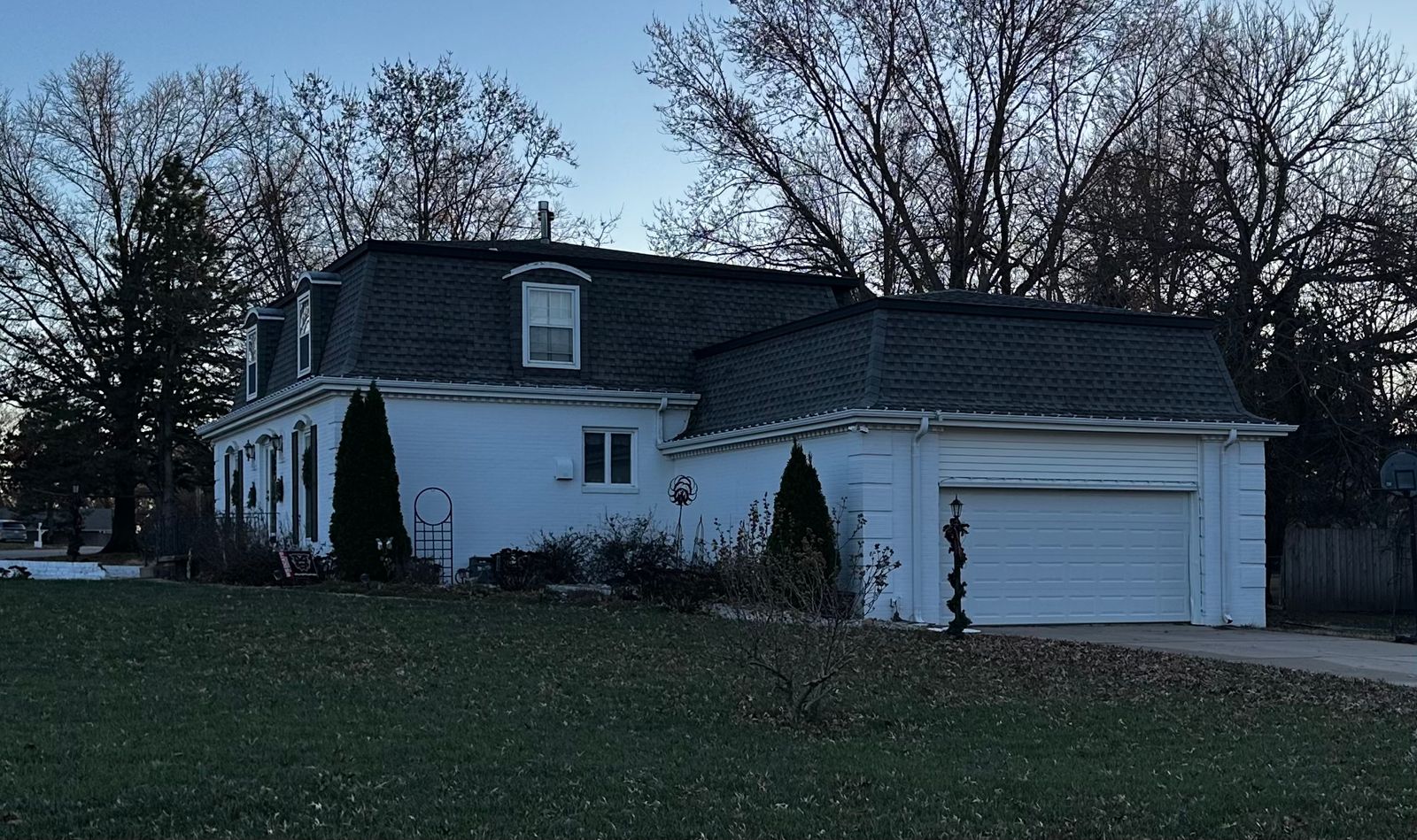 Same home with a clean roof after roof cleaning, El Dorado, KS