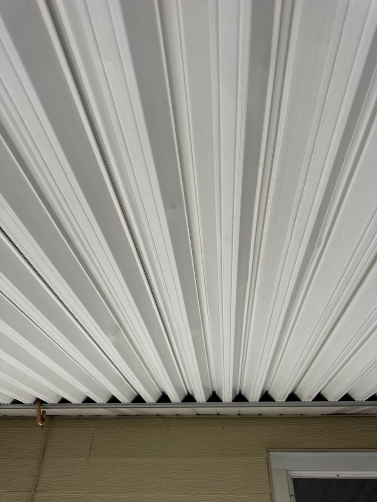 Metal patio cover after cleaning