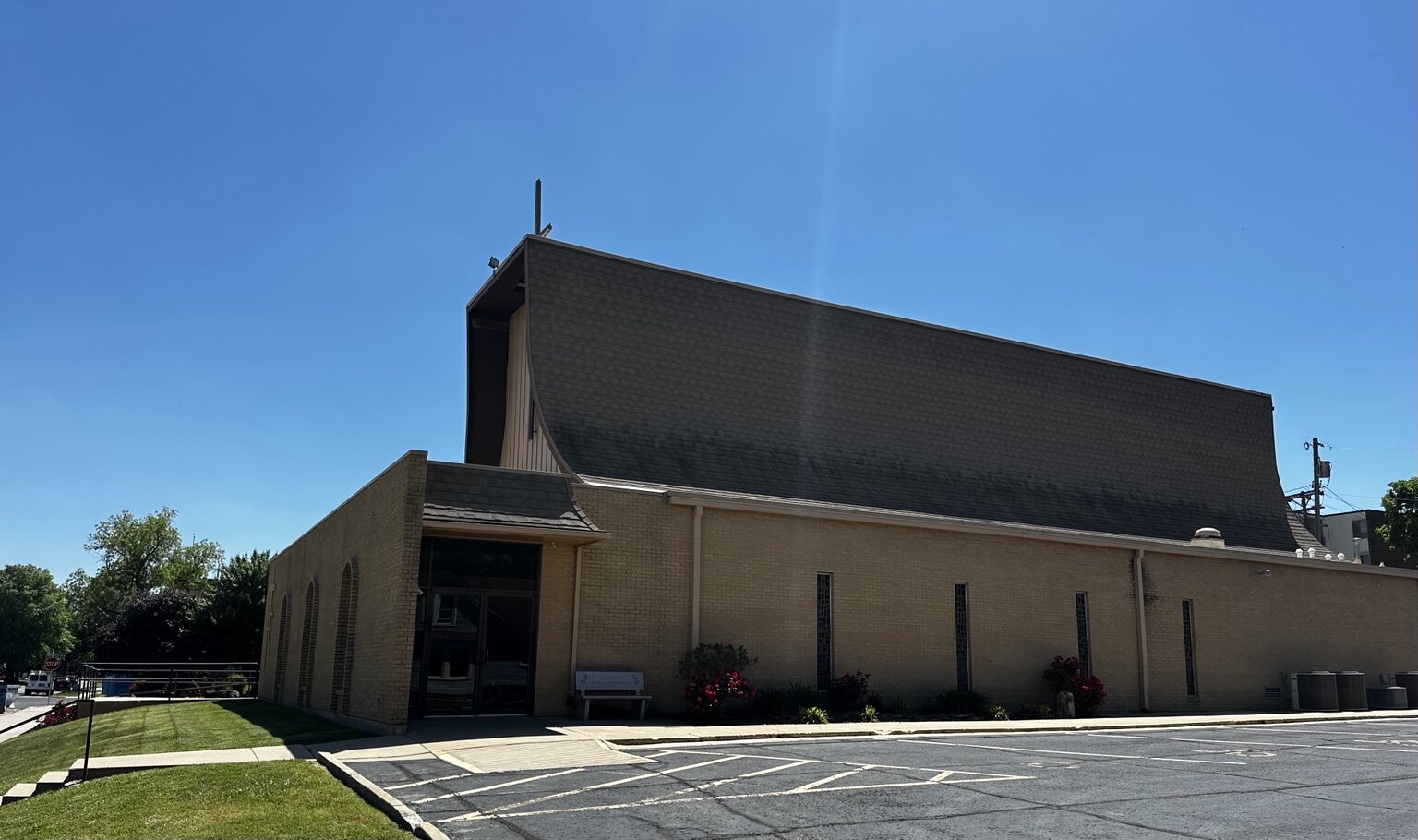 Church roof before black algae removal in El Dorado