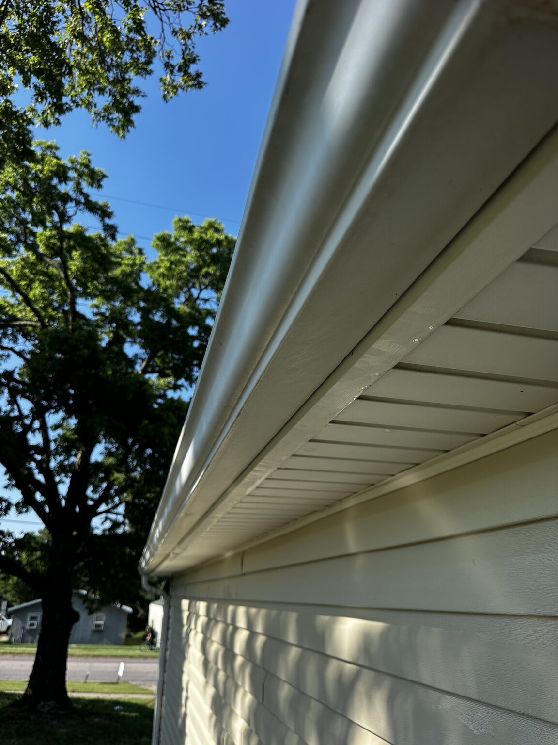 Clean gutter and soffit after exterior washing