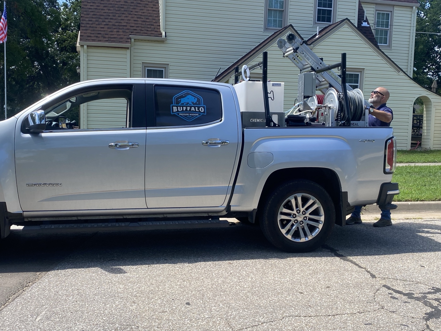 Buffalo Pressure Washing truck at the El Dorado house-washing project